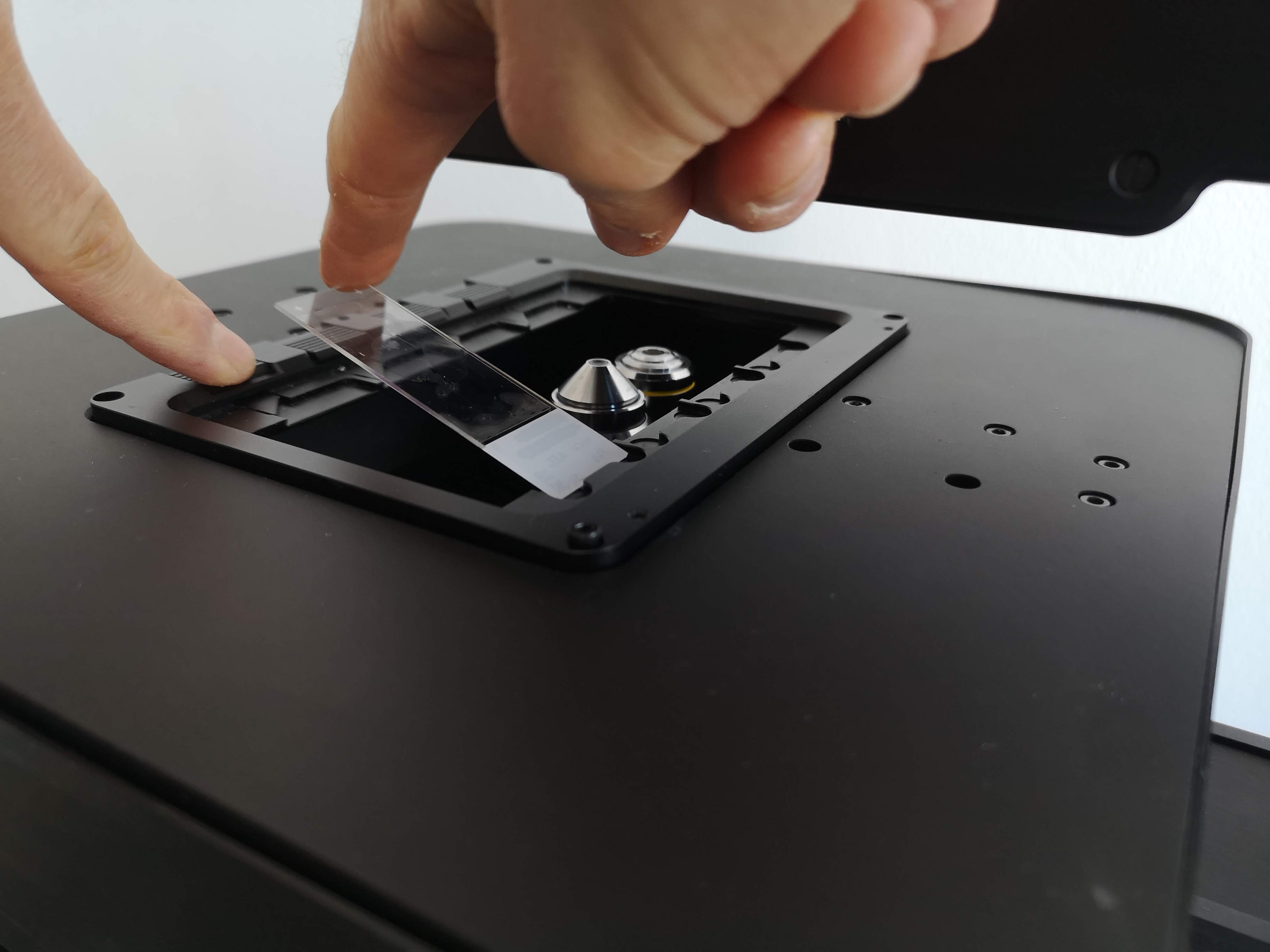 slide holder: pull back spring-loaded mechanism